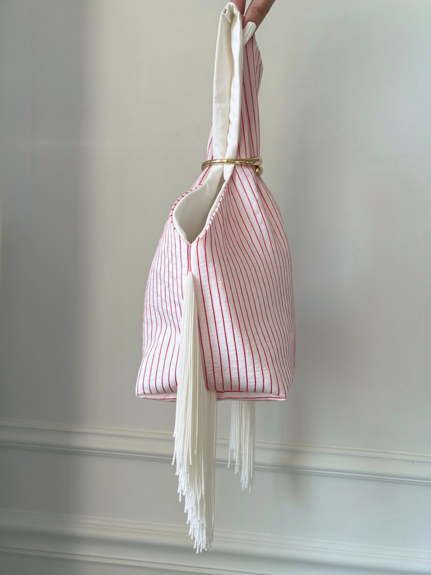 RIGA BUCKETFUL BAG + FRINGE